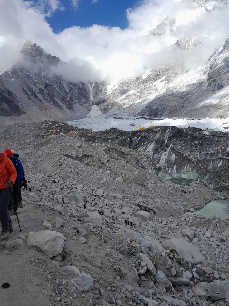 Crowding of yellow tents amidst white glacier.. Everest Base Camp.